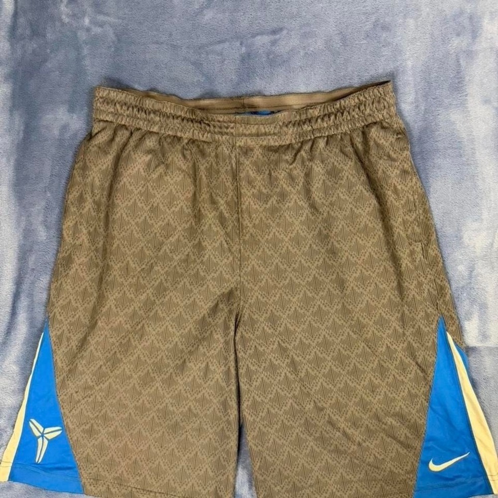 Nike Men's Brown Athletic Shorts with Blue Accent